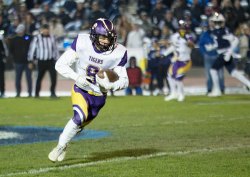Lemoore's Jace Silva with an interception and touchdown with less than a minute to play in the first half against Central Valley Christian.